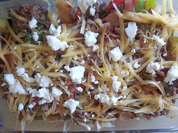 Cover with grated cheese and a bit of feta