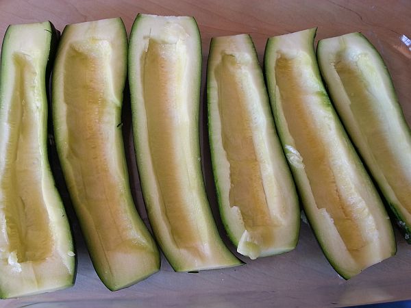 Line courgettes in an oven proof dish